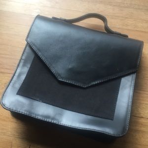 Fashionable local and global black leather handbag